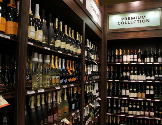 wine display, wood fixtures, retail display, signage, liquor display, gondola